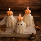 Soy wax ghost candle wearing a pumpkin hat, view 3