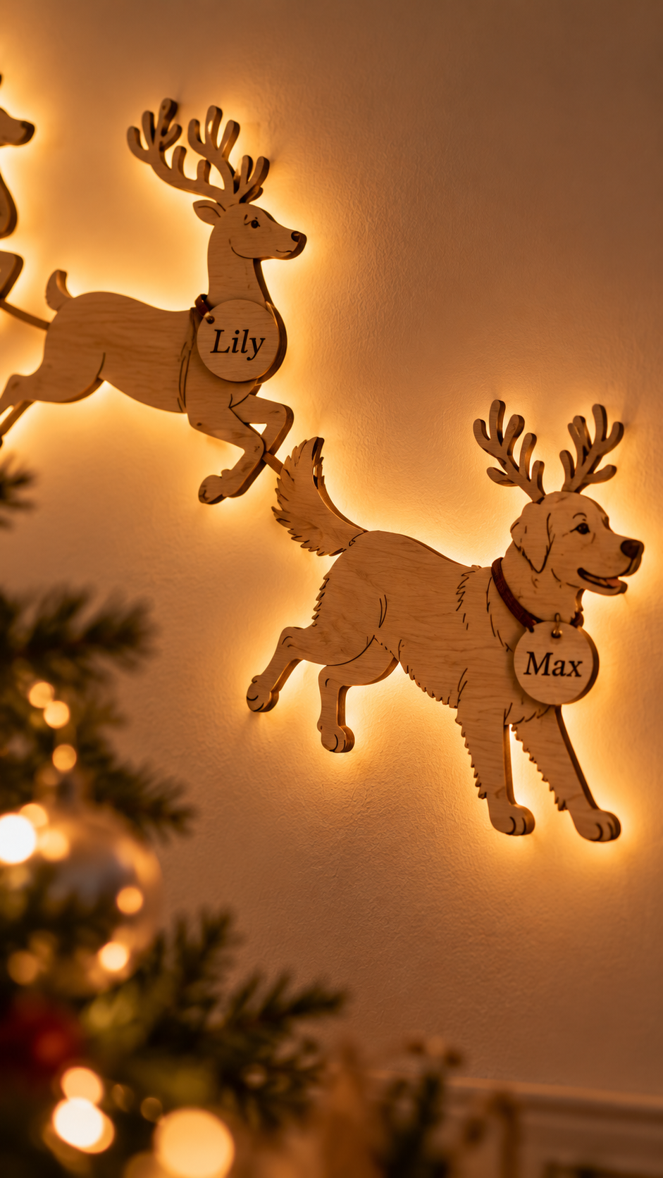 Close-up of engraved reindeer name tag Lily and golden retriever Rudolph tag Max with warm LED glow